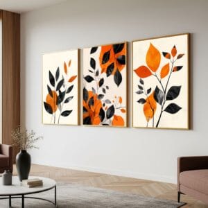 Abstract orange botanical triptych in gold frames, living room.