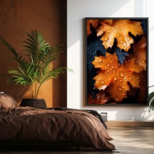 Autumn maple leaves print in black frame near brown bedspread.