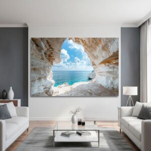 Large cave ocean view print in a modern interior setting.
