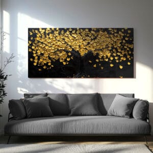 Gold leaf canvas wall art hanging above a modern sofa with soft lighting