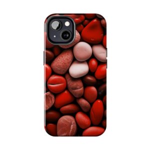 a close-up shot of a phone case featuring a detailed pattern of smooth, rounded red and pink pebble stones